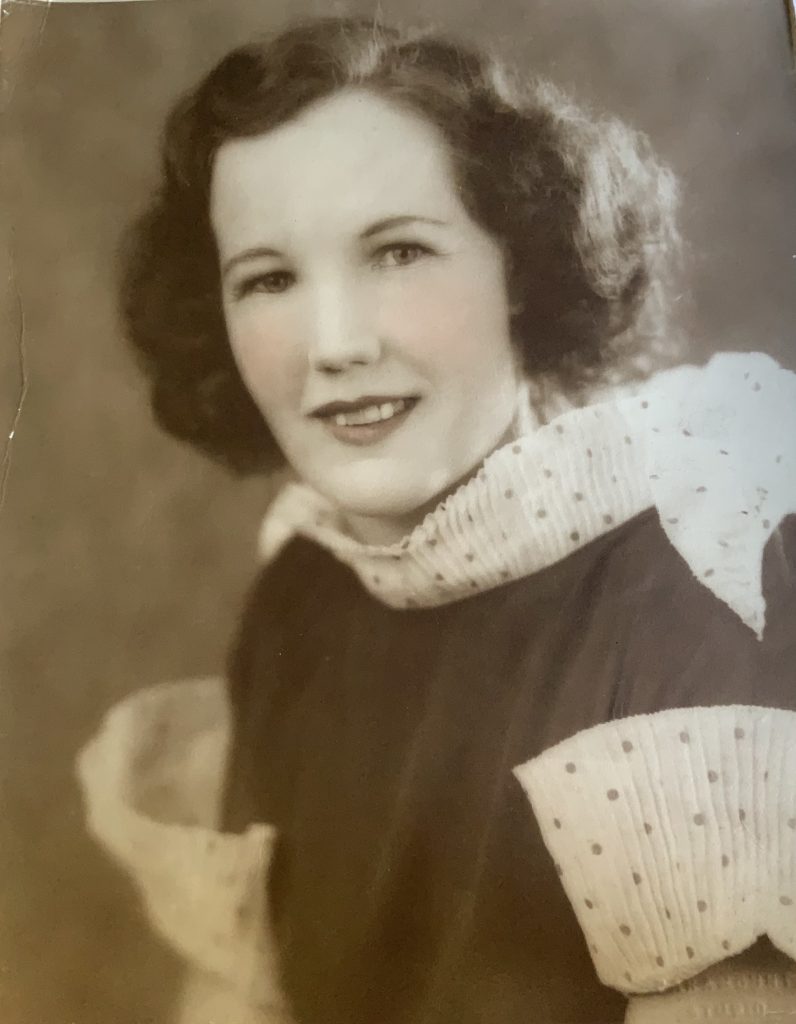 Jean robinson ( also jean frazer) a vintage photo of my nana - sepia toned and hand coloured  in a polka dot frock